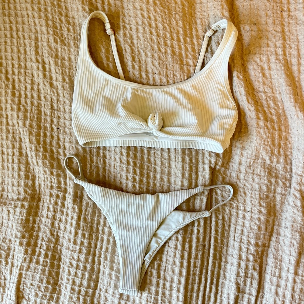 White Frankie’s bikini, very cheeky bottoms, size small in bottoms and top